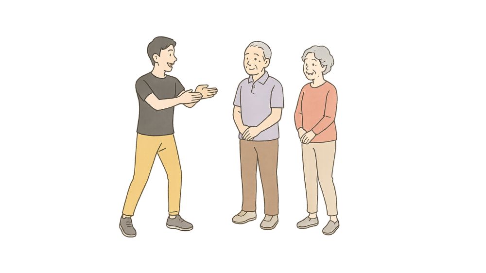 ダンス指導員が高齢者の男女にダンスの楽しさを教えている