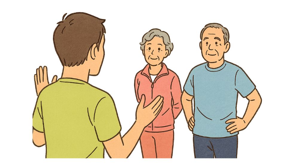 高齢者夫婦が講師からの説明を受けている